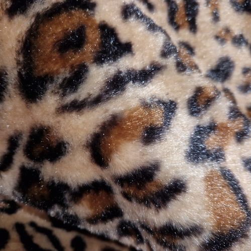 Imitert leopard pels