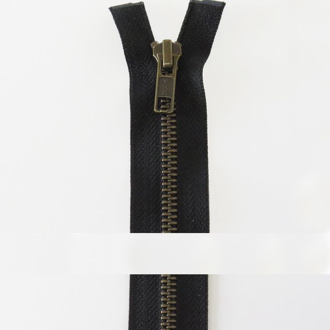 Hovedbilde YKK 6 mm antikk messing delbar sort 65 cm